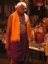 Another well-dressed man ready to enter the temple.